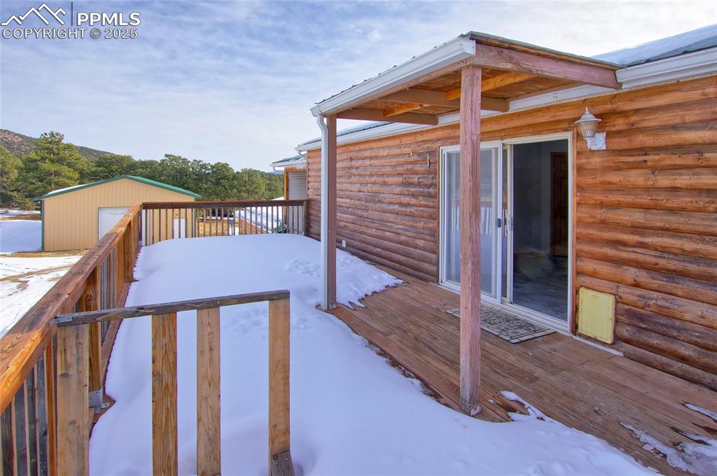 Image 42 of 50: Walk out from kitchen to rear deck