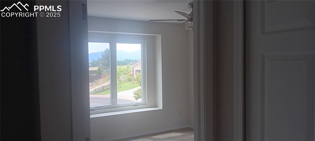 Image 45 of 45: Front BR with view of Pikes Peak