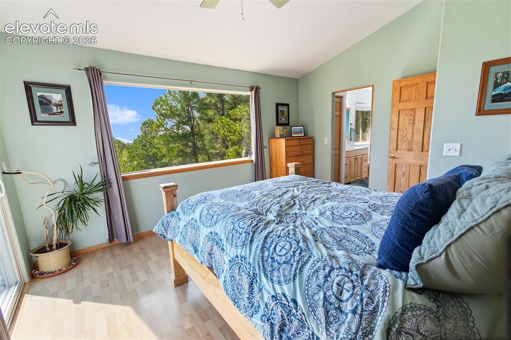 Image 13 of 27: Upper Level Master Bedroom