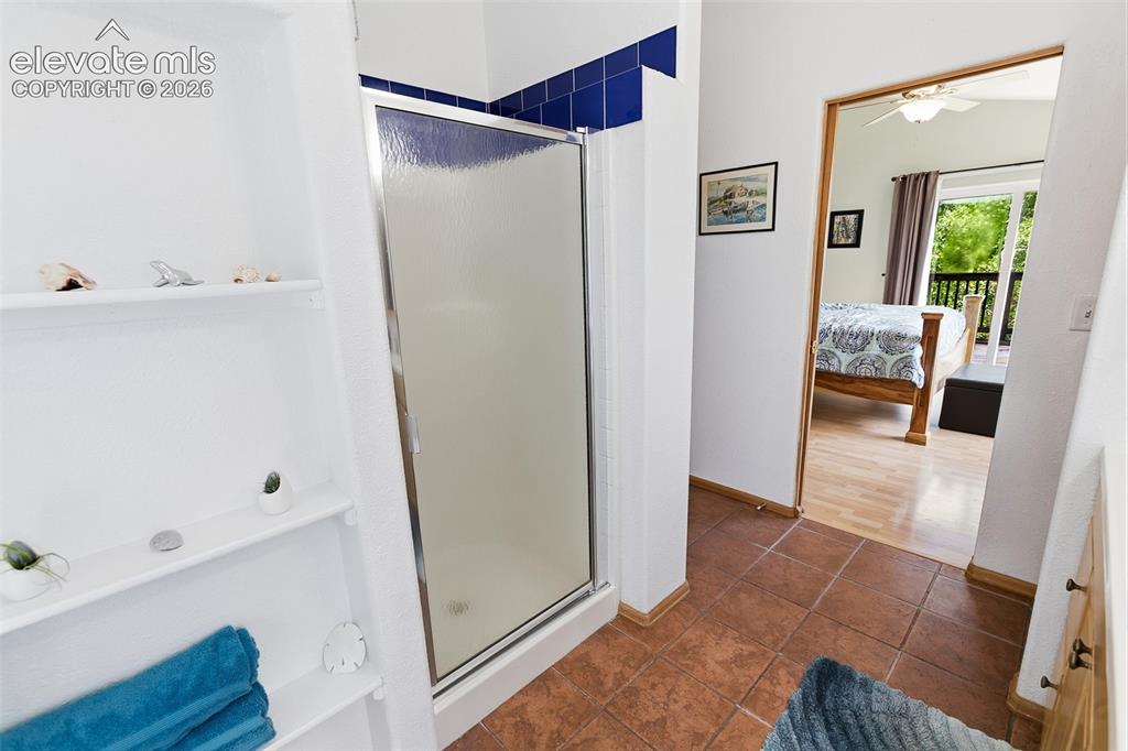 Image 15 of 27: Upper Level Master Bedroom