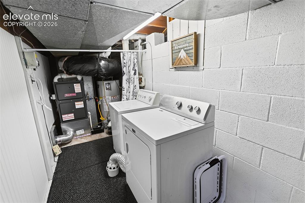 Image 20 of 27: Lower Level Laundry - Mechanical