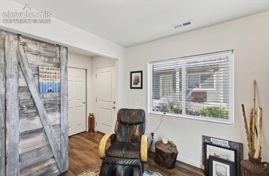 Image 11 of 48: This flex room is a comfortable space offering many uses, including home of