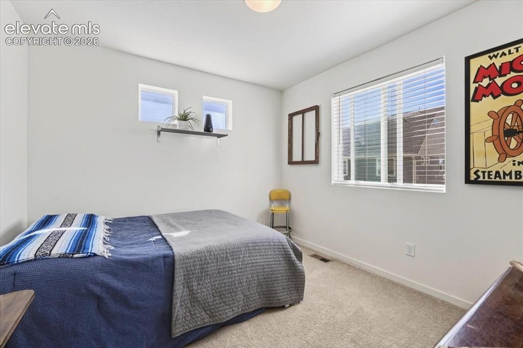 Image 21 of 48: The second level includes two bedrooms.