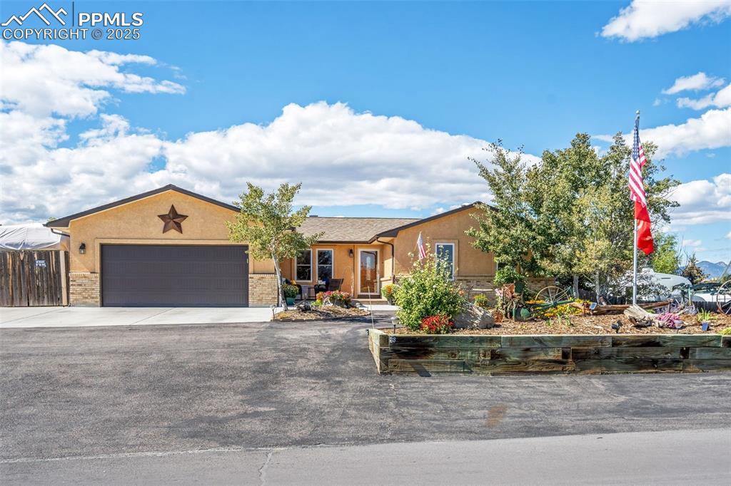Caption: Gorgeous stucco ranch plan offering main level living on a spacious 1/2 acre lot with great curb app