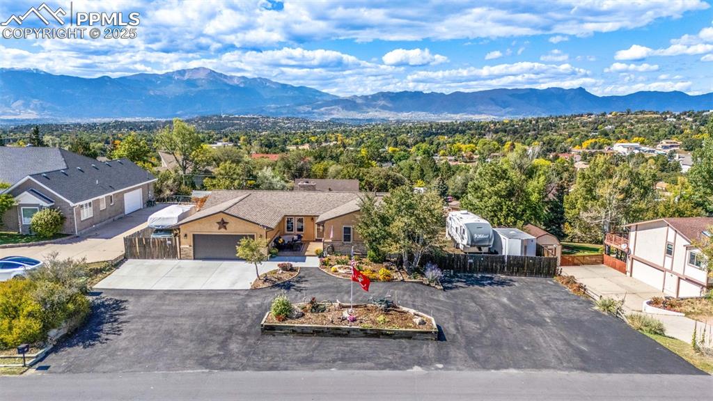 Image 2 of 49: Amazing Pikes Peak and mountain views & plenty of RV parking!