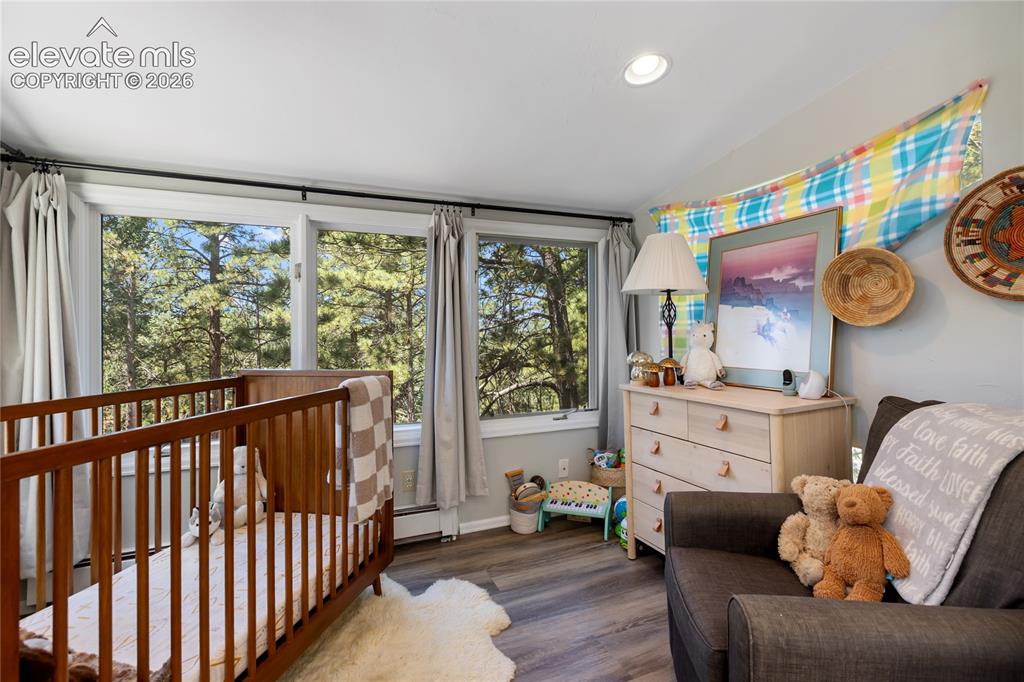 Image 14 of 38: The views are wrapped around the rooms and even lead into the sunroom...
