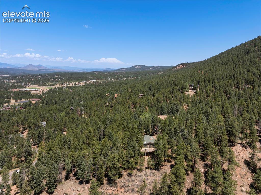 Image 16 of 38: Well, come on, you will want to see this peaceful and serene Primary Bedroo