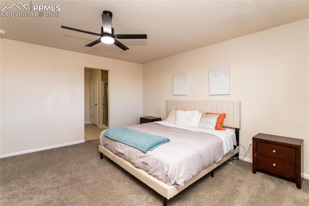 Image 21 of 39: Master Bedroom