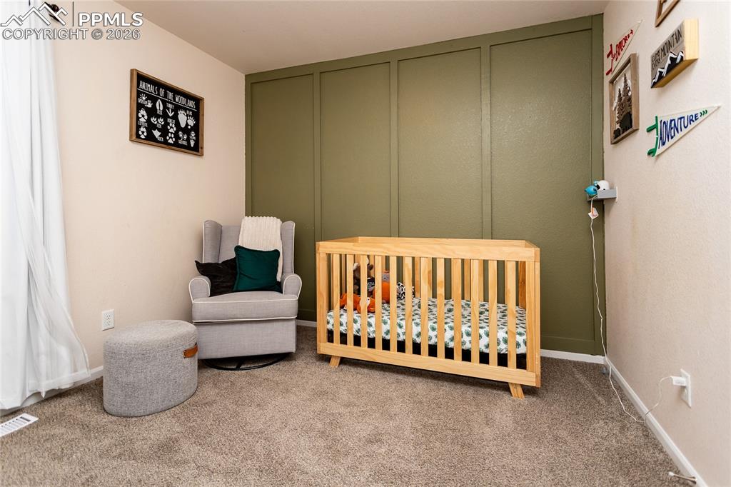 Image 24 of 39: Bedroom