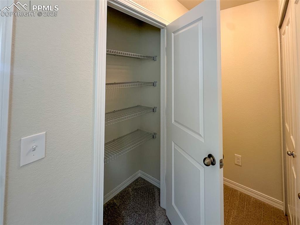 Image 27 of 35: Upstairs linen closet 