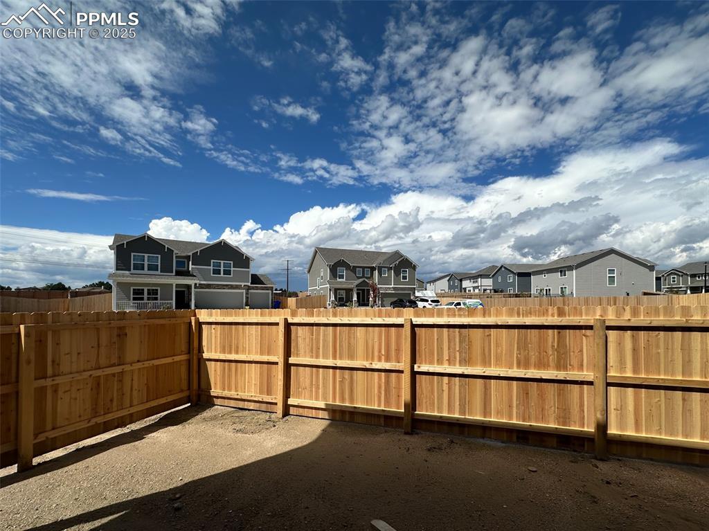 Image 9 of 35: Backing to open space- landscaping will be completed 