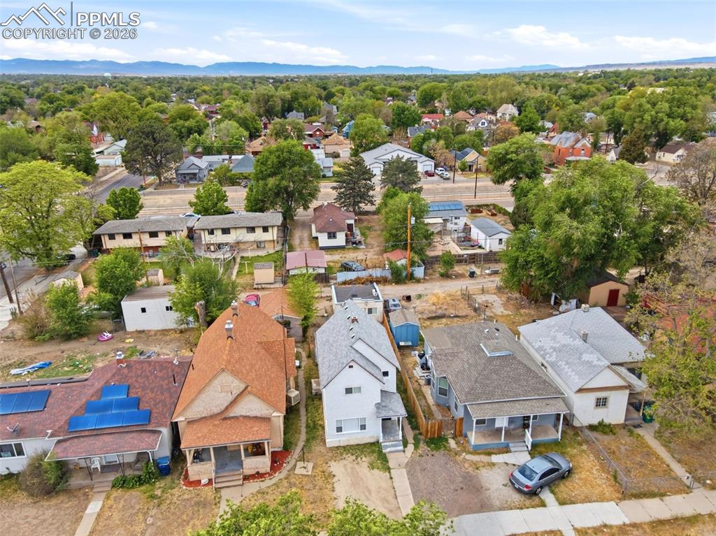 Image 45 of 50: Aerial perspective showcasing a residential neighborhood with diverse housi