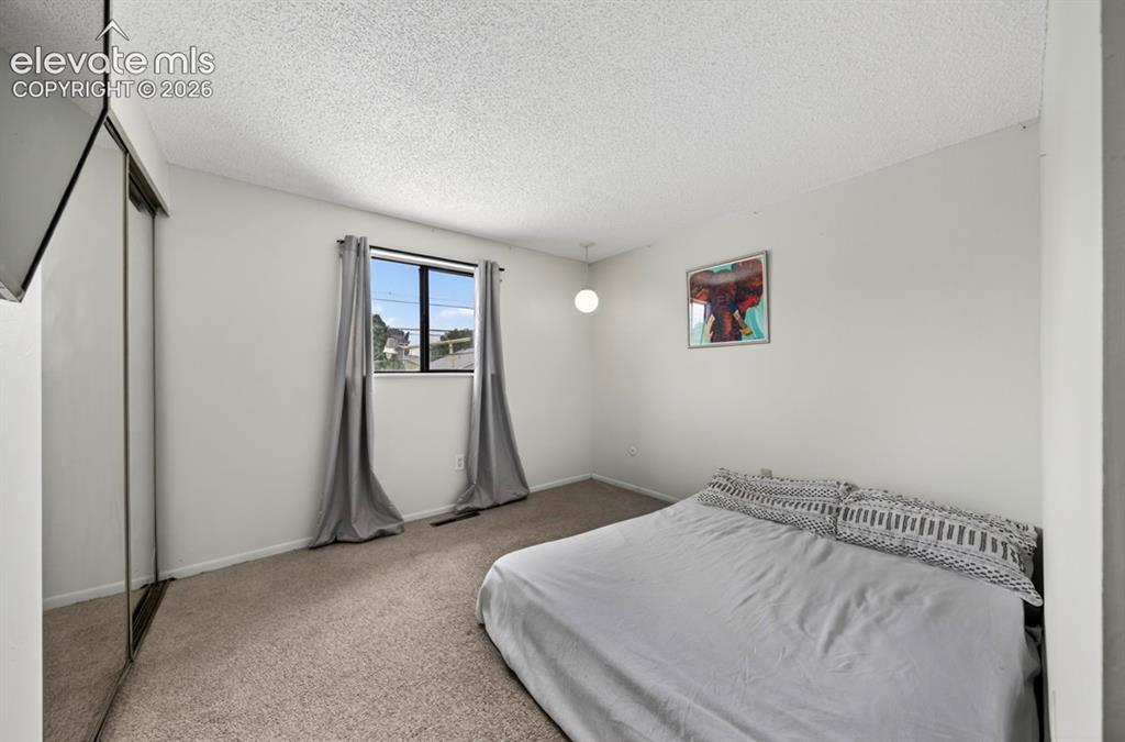 Image 12 of 23: Bedroom