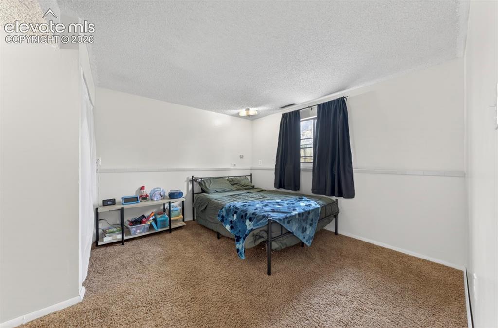 Image 16 of 23: Bedroom