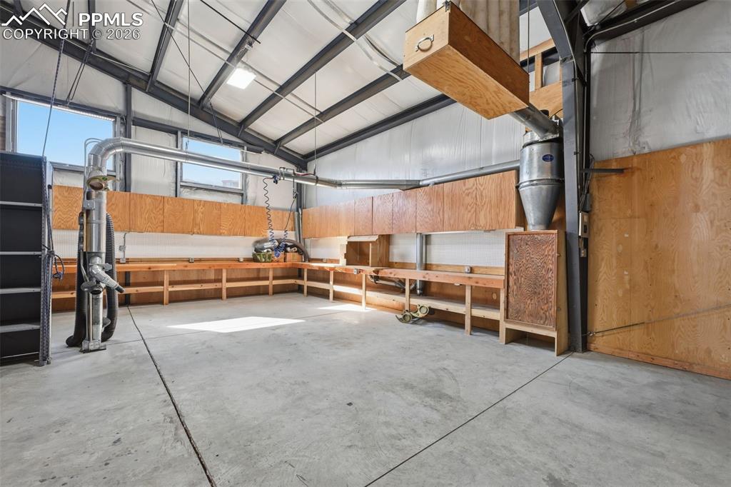 Image 17 of 34: Loft: Approx. 250 SF loft adds valuable storage or supplemental workspace
