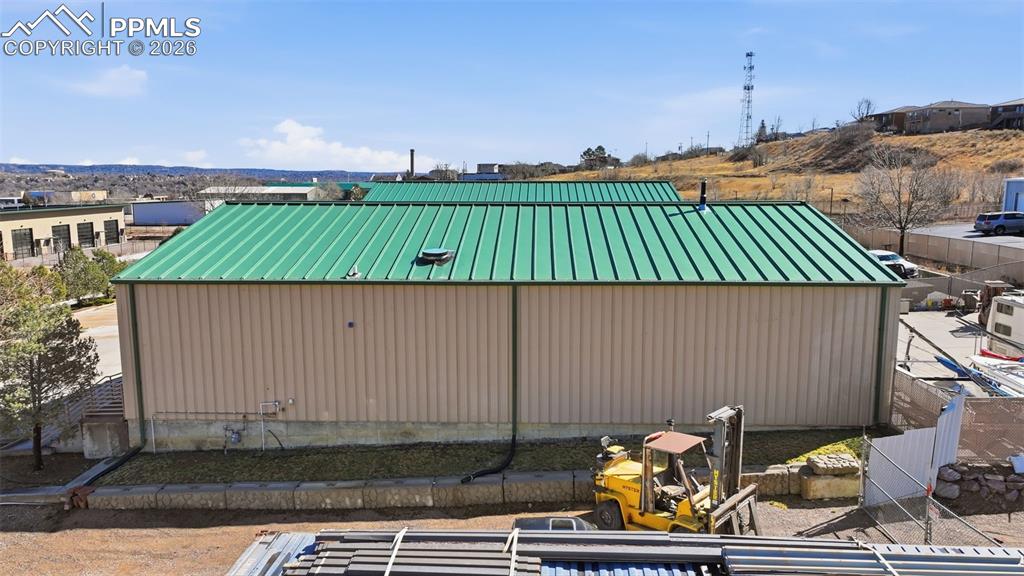 Image 30 of 34: 0.37-acre site with front and rear access, parking, and operational flexibi