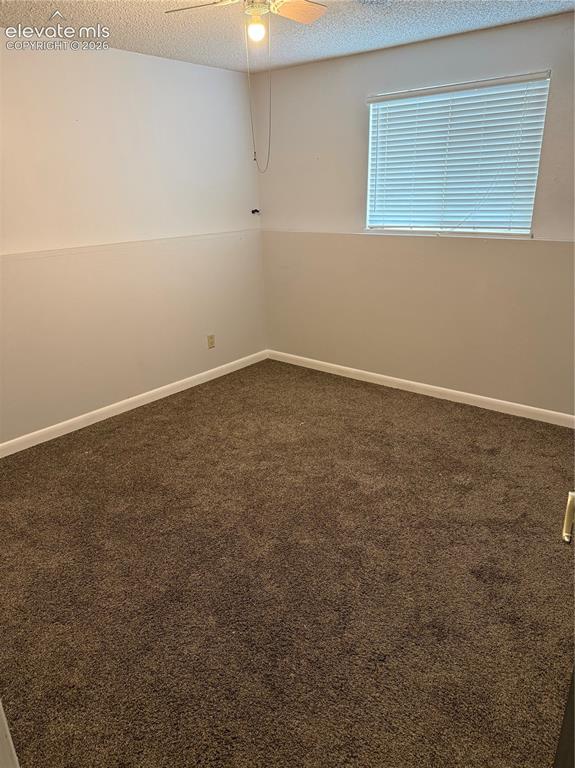 Image 10 of 16: Brown carpet flooring, neutral wall tones, window with horizontal blinds, a