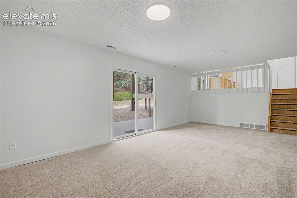 Image 16 of 46: Walkout to 18 x 10 Concrete Patio