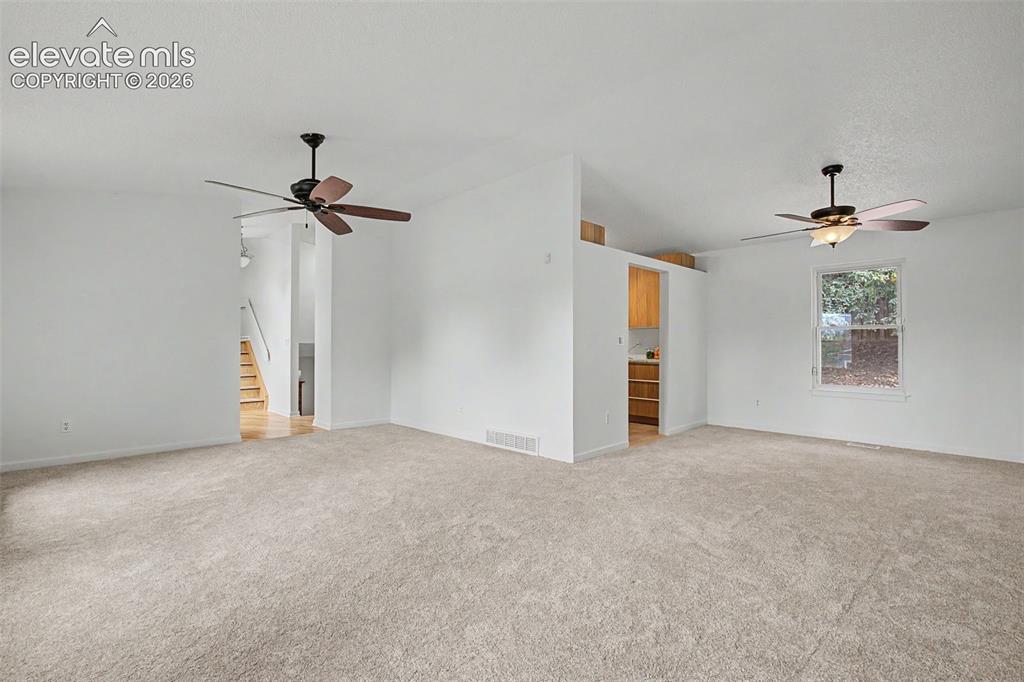 Image 24 of 46: Open Dining Room to Living Room