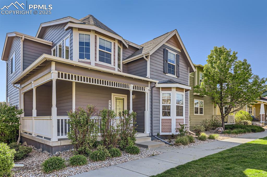Image 2 of 34: View of front of property with a porch