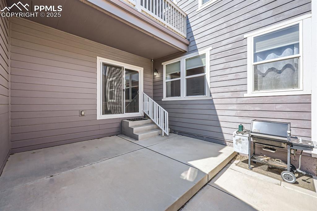 Image 28 of 34: View of patio / terrace featuring a balcony and grilling area