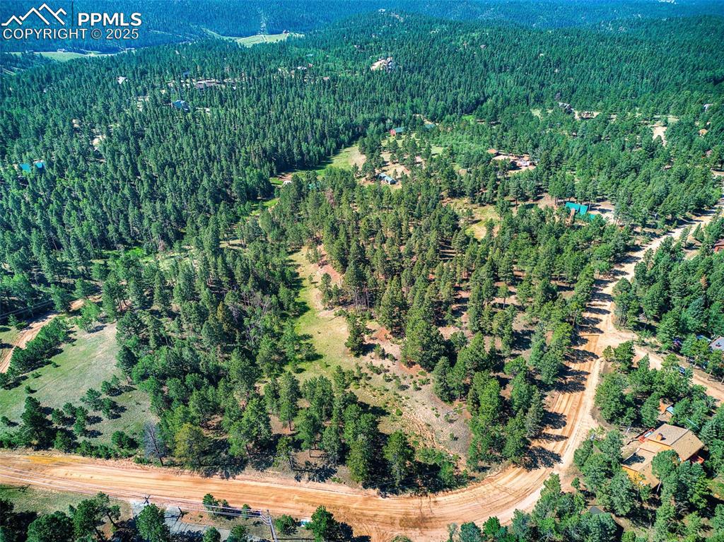 Image 22 of 26: Aerial view of property and surrounding area 