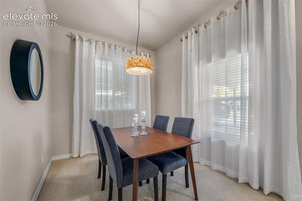 Image 6 of 32: Integrated lighting fixture with a decorative shade