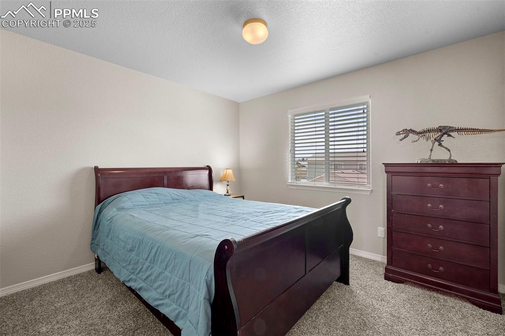 Image 12 of 33: Bedroom