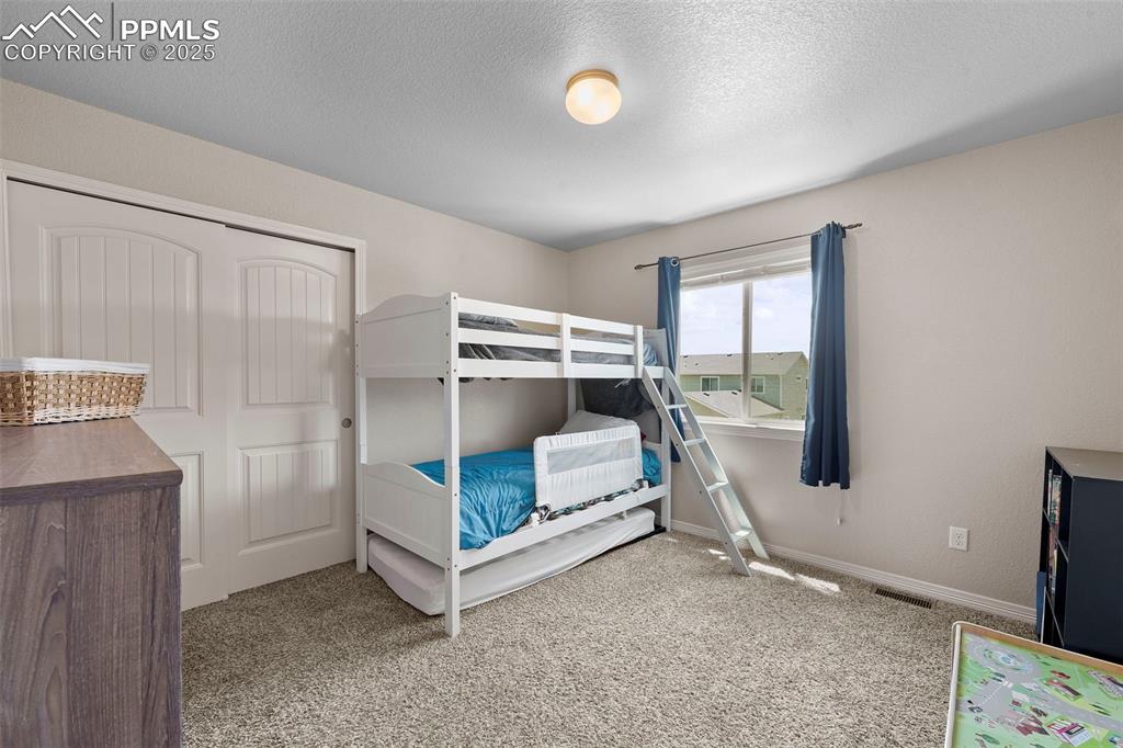 Image 18 of 33: Bedroom