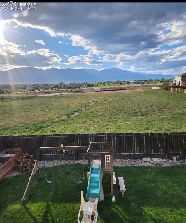 Image 38 of 45: Mountain view with rural landscape