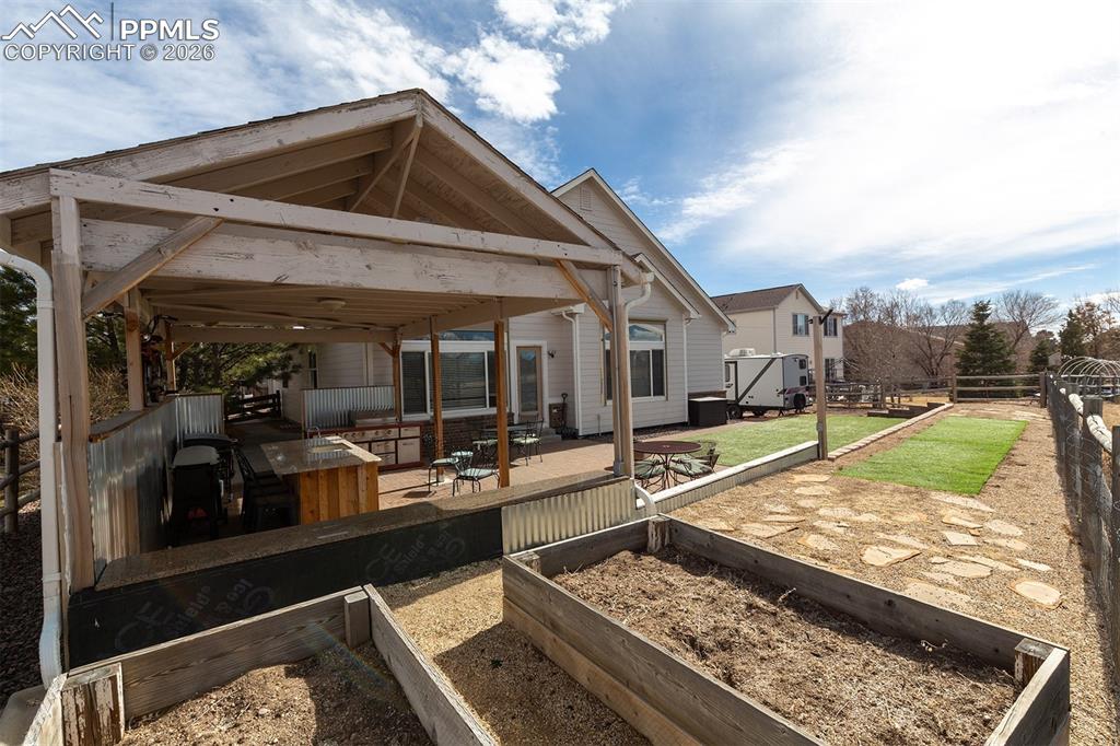 Image 27 of 34: Raised garden beds.