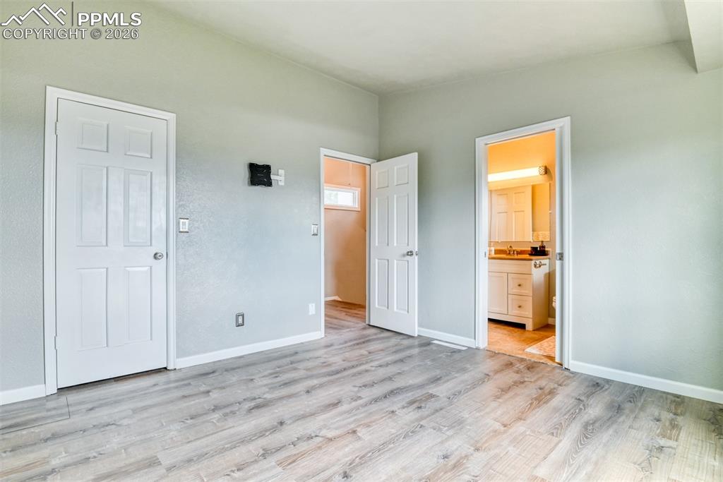 Image 13 of 28: Master Bedroom