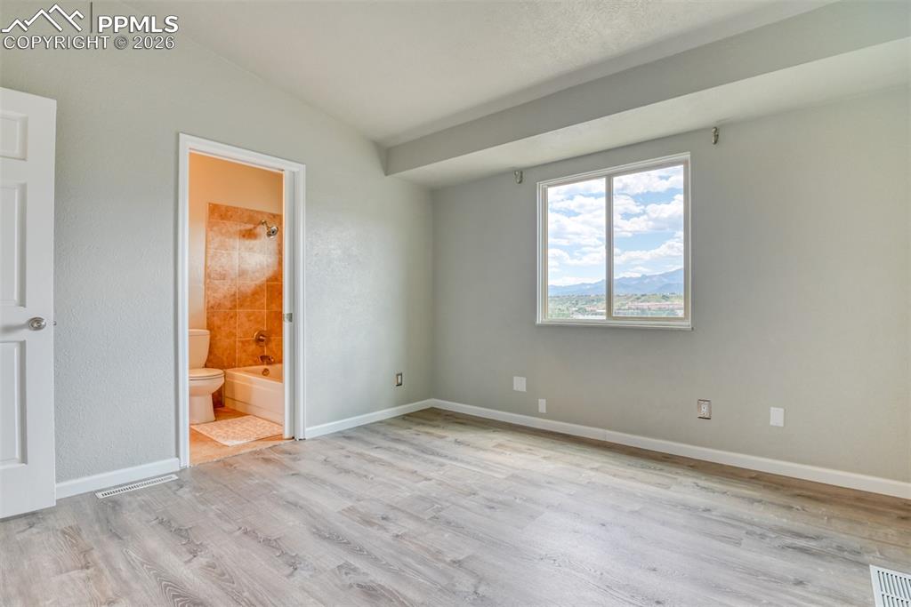 Image 14 of 28: Master Bedroom