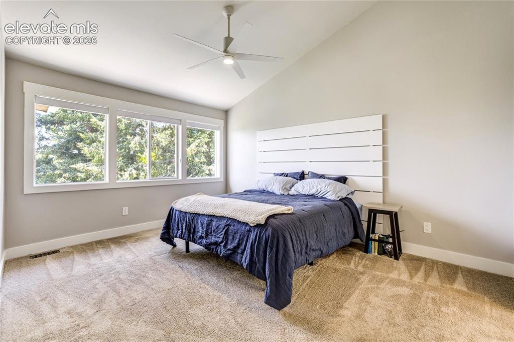 Image 29 of 50: A peaceful sanctuary offering private outdoor access and a connection to th