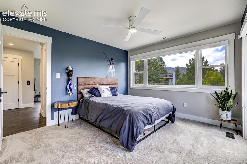 Image 33 of 50: Spacious upper-level accommodations with beautiful natural light and mounta