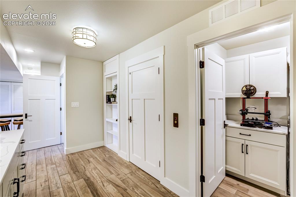 Image 39 of 50: Convenient secondary laundry area serving the lower-level living spaces.