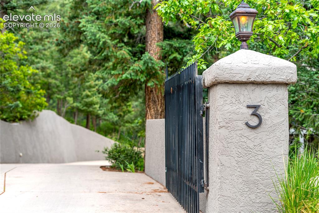 Image 5 of 50: A warm welcome home begins with a dramatic entry designed to set the tone f