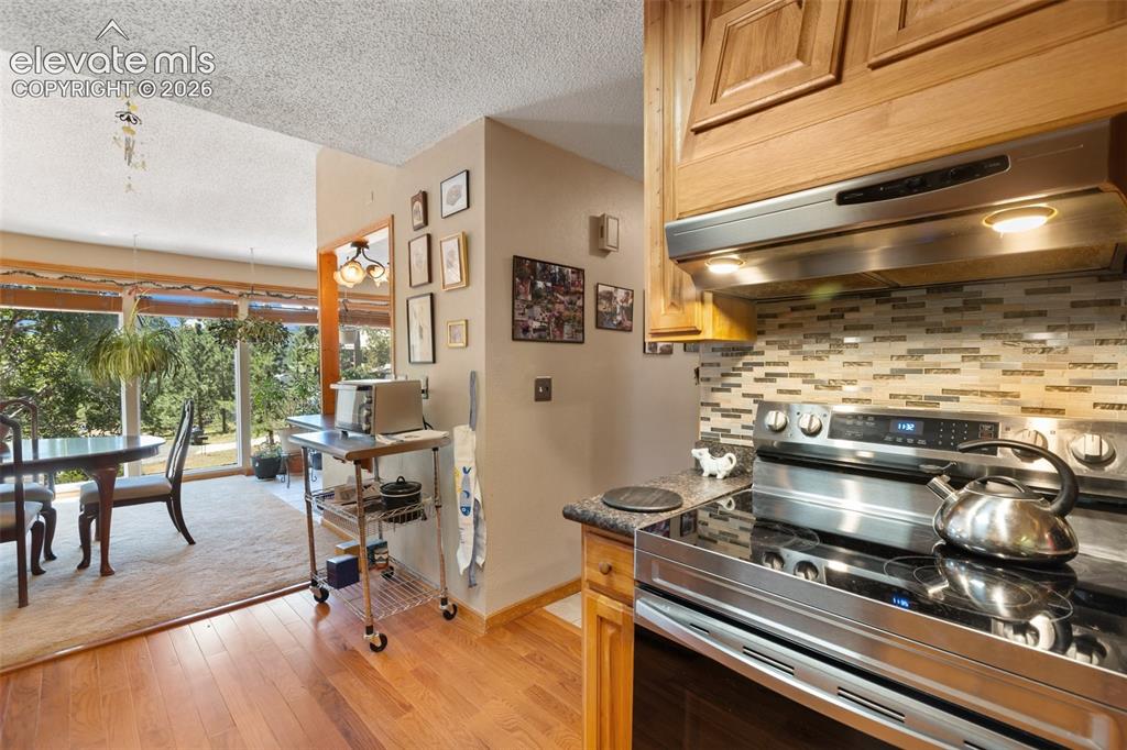 Image 11 of 31: Kitchen and Dining Room