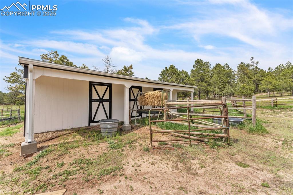 Image 34 of 43: 3-stall horse stable