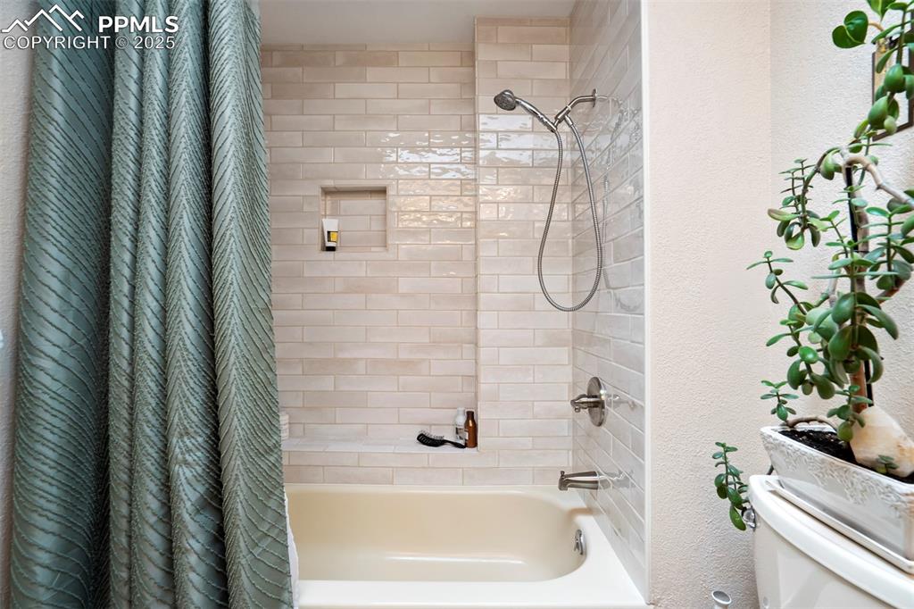 Image 19 of 48: Newly Tiled Shower