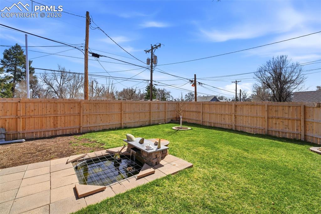 Image 27 of 35: Oversized Windows over Kitchen Sink