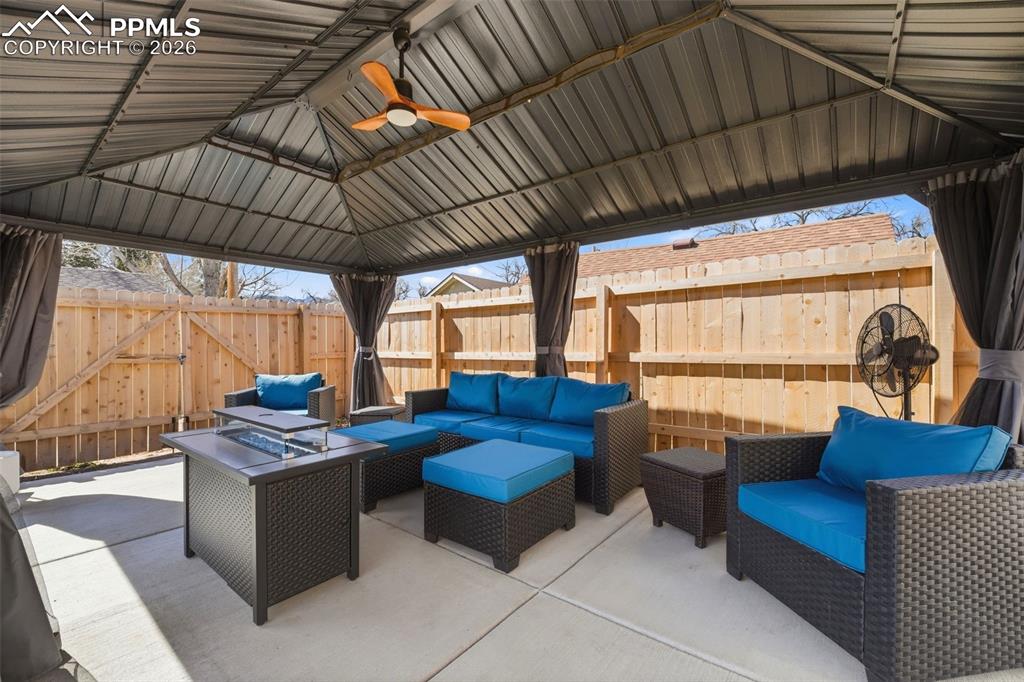 Image 30 of 35: Updated Bathroom with Tile Floor and Clawfoot Tub/Shower combo