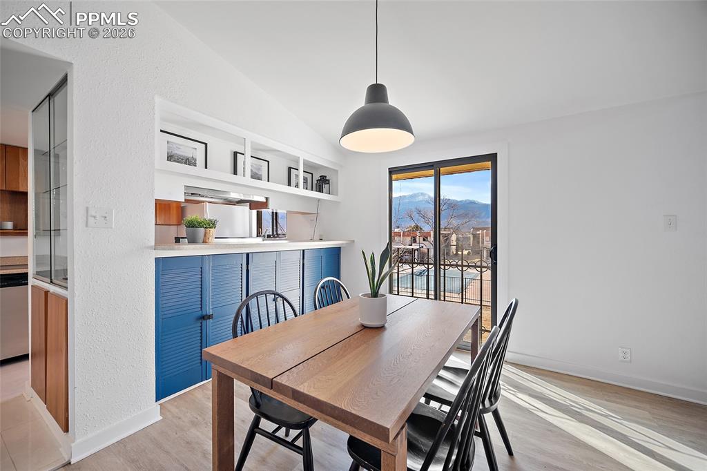 Image 14 of 43: dining area with mountain views