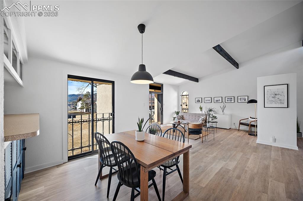 Image 15 of 43: wdining area with mountain views