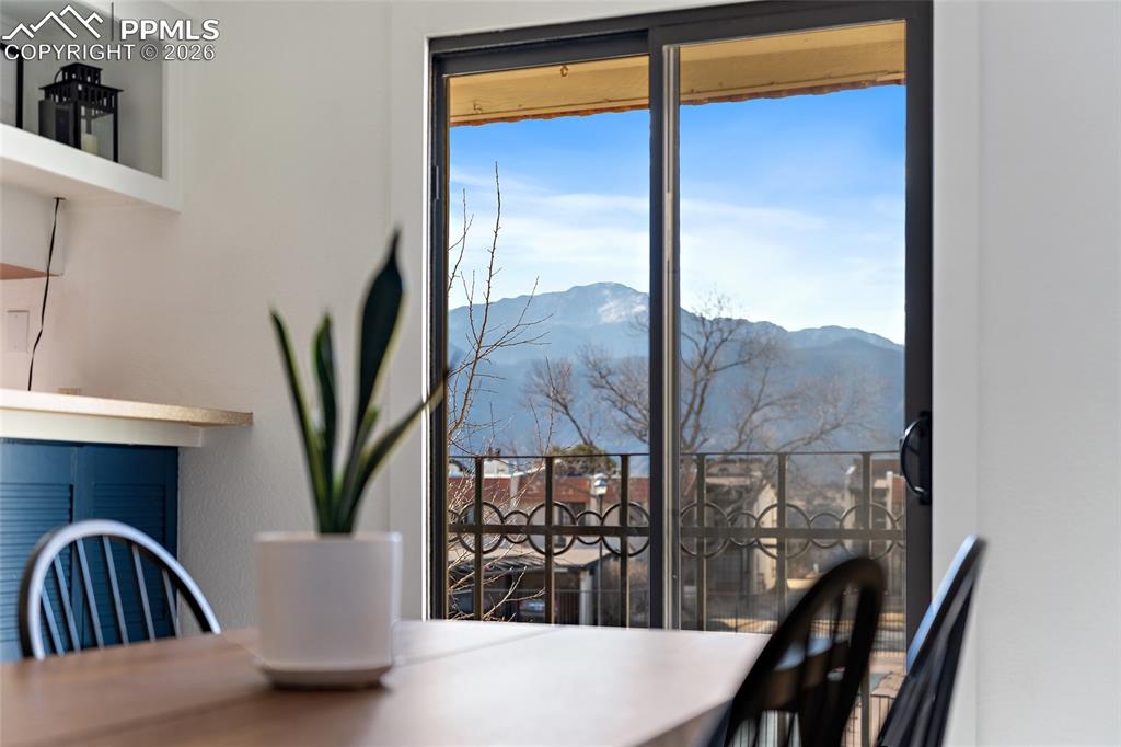 Image 17 of 43: dining area with mountain views