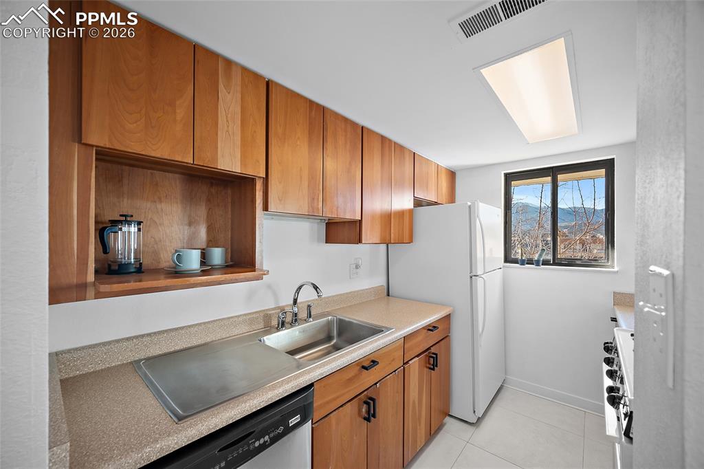 Image 21 of 43: kitchen with mountain views
