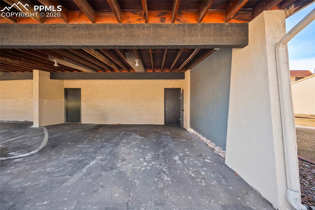 Image 41 of 43: Carport with 10 x 10 storage unit