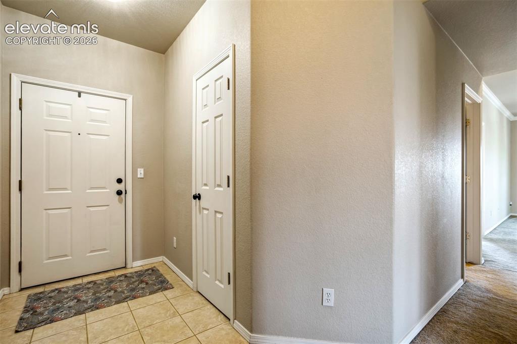 Image 5 of 50: Front Entrance with coat closet