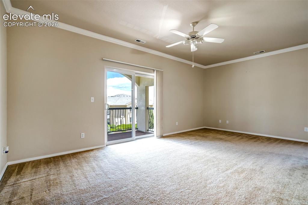 Image 7 of 50: Sliding glass door to private balcony