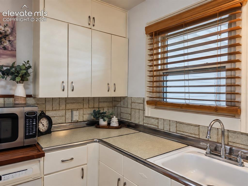 Image 19 of 48: Window Over Kitchen Sink